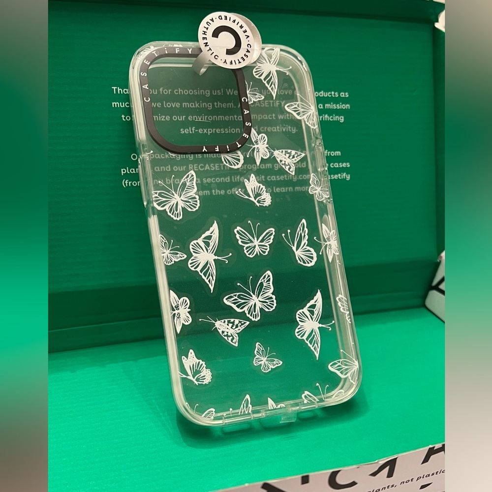 Brand new: Casetify iPhone 13 clear case/white butterfly print